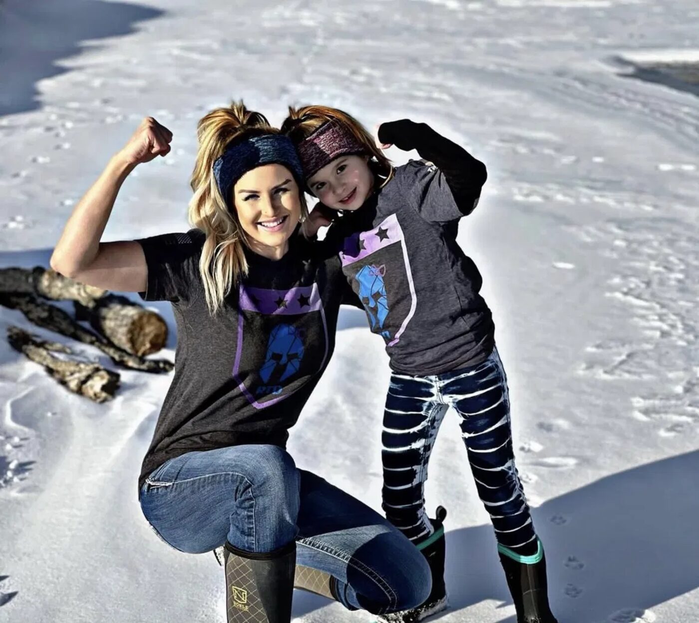 A mom and her daughter in RTD shirts