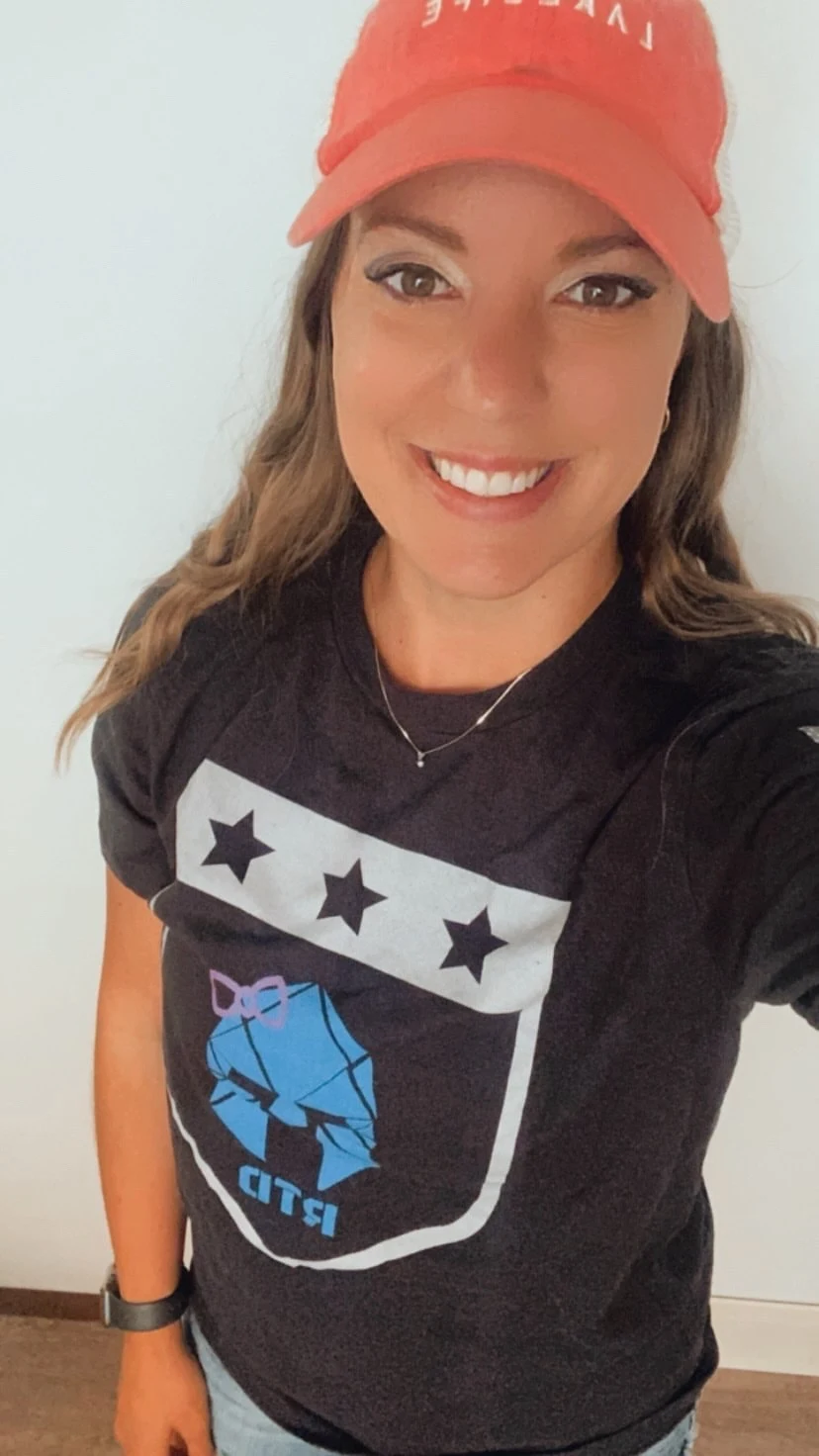 RTD supporter wearing a red cap and RTD shirt